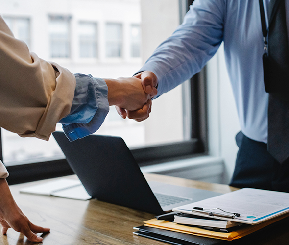 Two people shaking hands